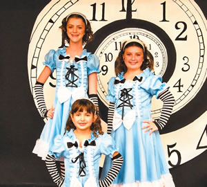 Actresses (from left) Hannah Williams, Alyse Glaser and Marlo Nettel play Alice in all her sizes in the Performing Arts Center of Kapolei's rendition of 'Alice in Wonderland Jr.' premiering tomorrow (Oct. 21) at the Kapolei High School Forum. Photo courtesy of PACK.